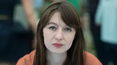 Sally Rooney claims she will not travel to the UK because of legal concerns